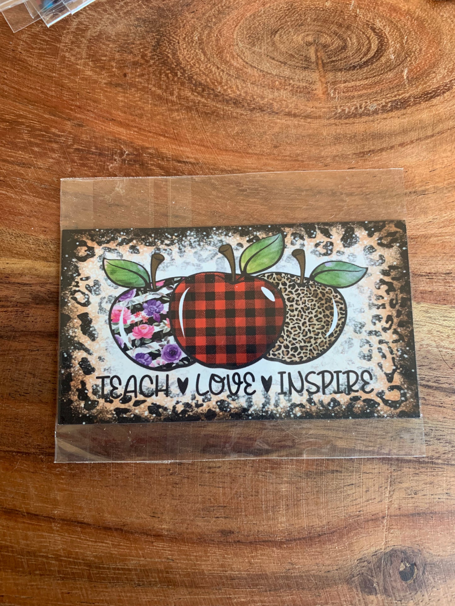 Teach Love Inspire Apple magnet